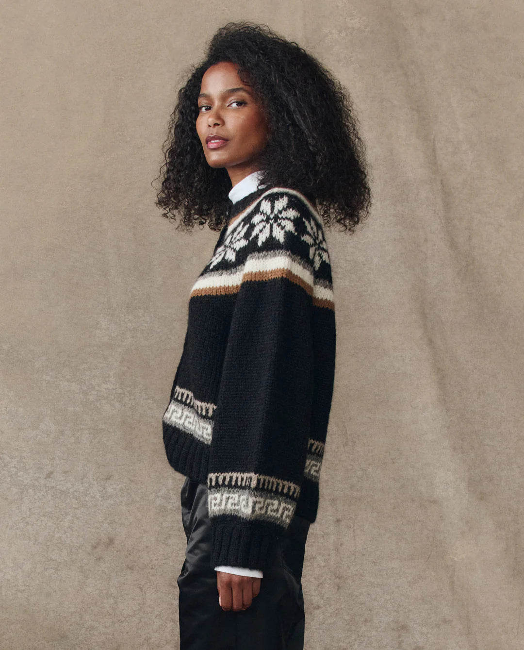 The Snowflake Ice Rink Cardigan. Black