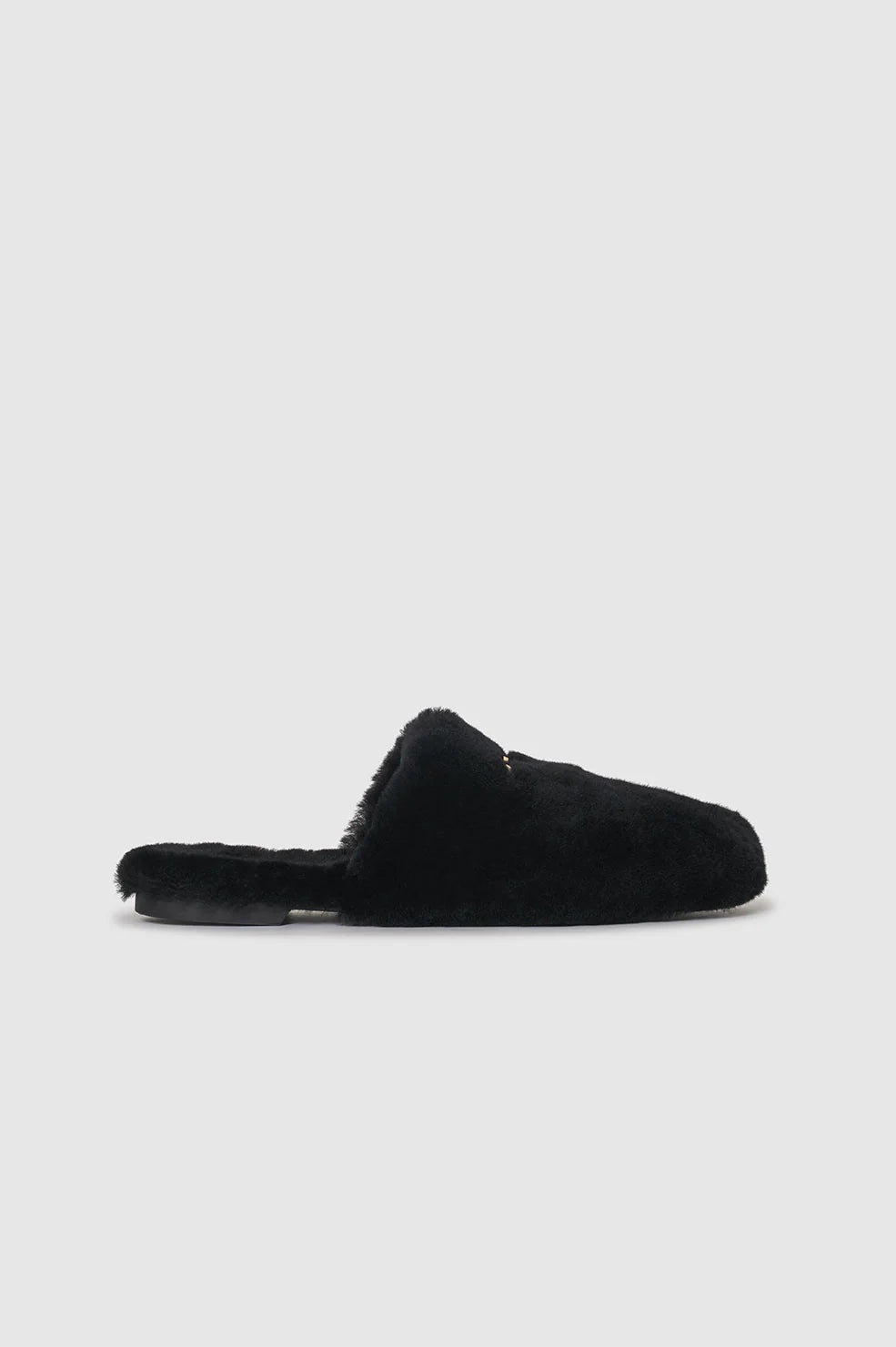 Shearling Mules in Black