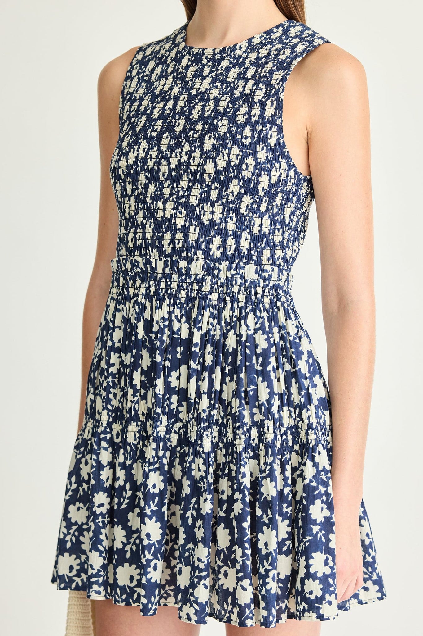 Lore Smocked Mini Dress in Navy Floral Stamp