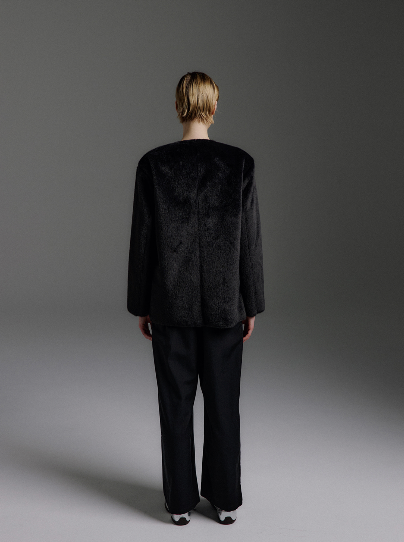 Donna Lightweight Collarless Faux Fur Jacket in Black