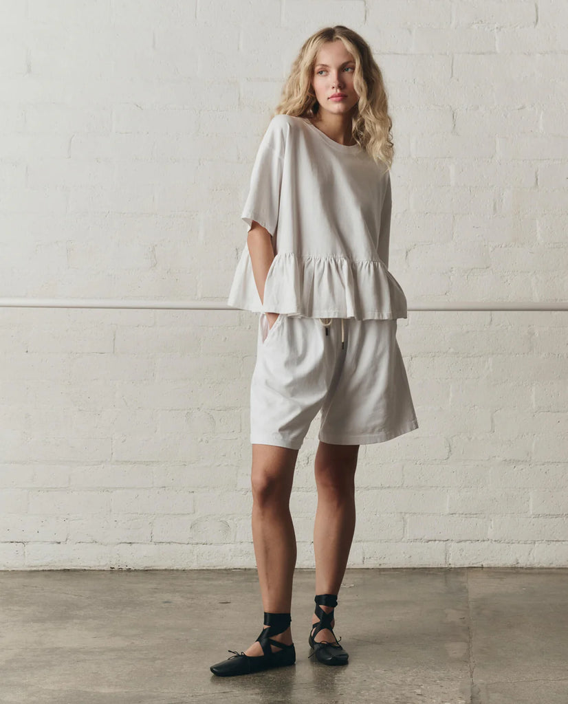 The Oversized Ruffle Peplum Tee. True White