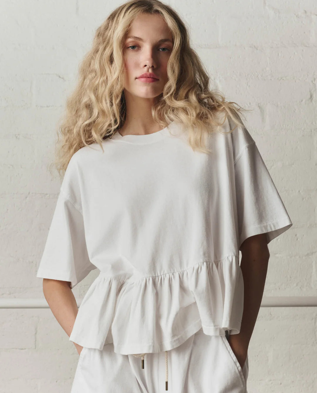 The Oversized Ruffle Peplum Tee. True White