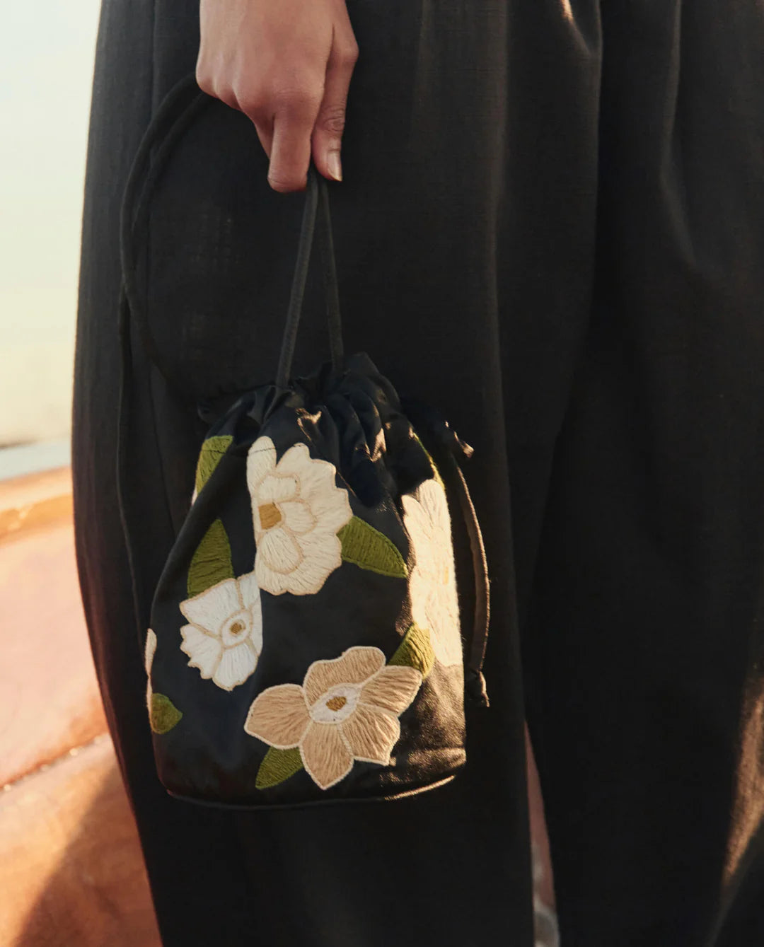 The Embroidered Cinched Bucket Bag. Black