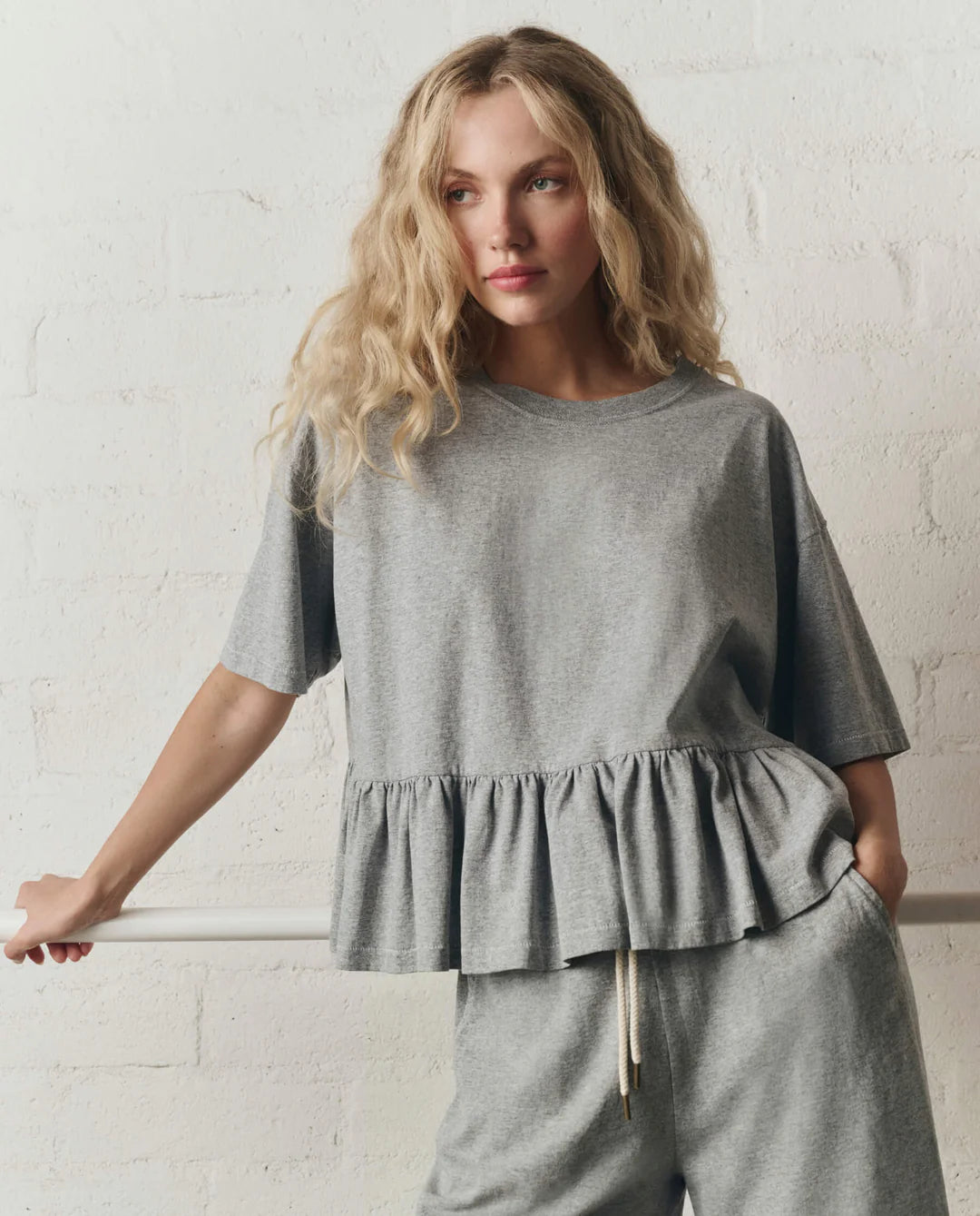 The Oversized Ruffle Peplum Tee. Heather Grey